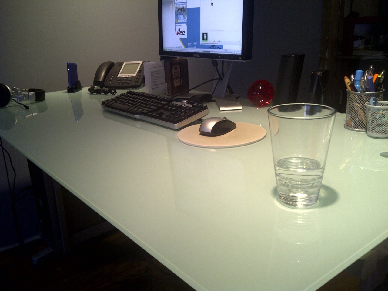 Photograph attached to the clutter-free desk post